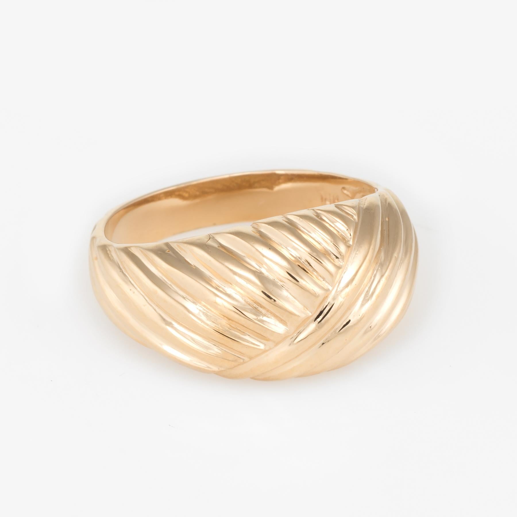 Elegant estate cocktail ring, crafted in 18 karat yellow gold. 

Finely detailed textured medium rise domed mount.   

The ring is in excellent condition. 

Particulars:

Weight: 3.6 grams

Stones:  N/A.

Size & Measurements: The ring is a size 6