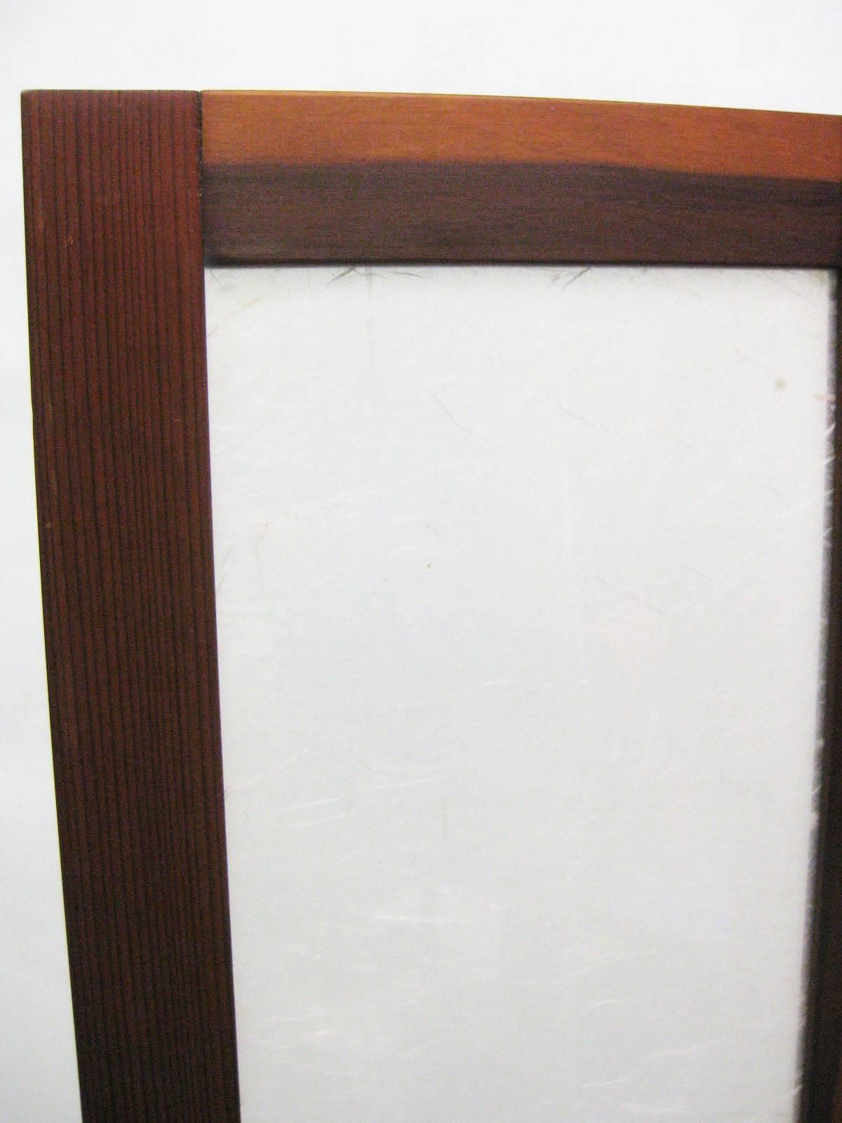 White textured fiberglass with teak hinged folding screens or room dividers.