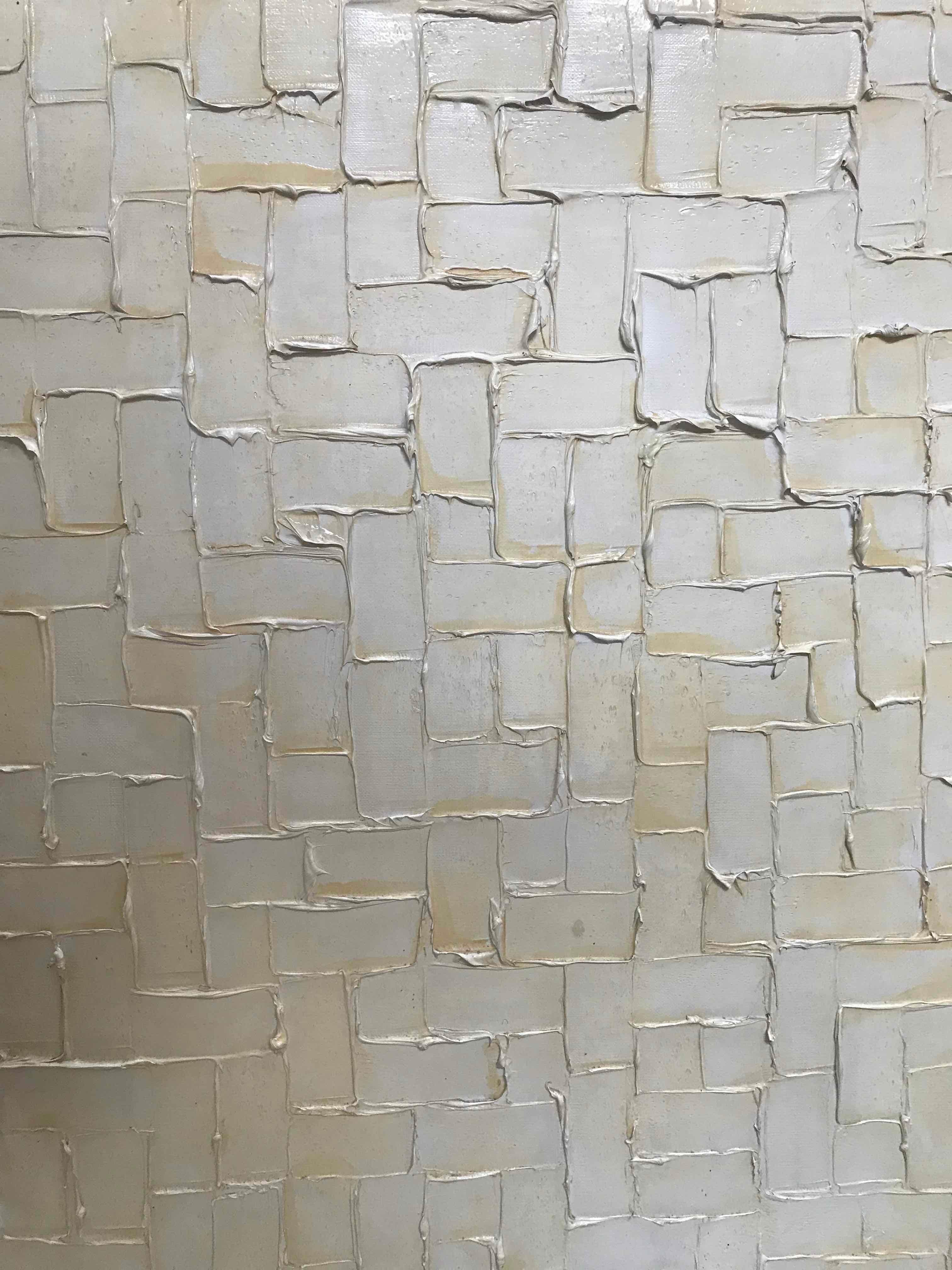 A textured geometric painting.