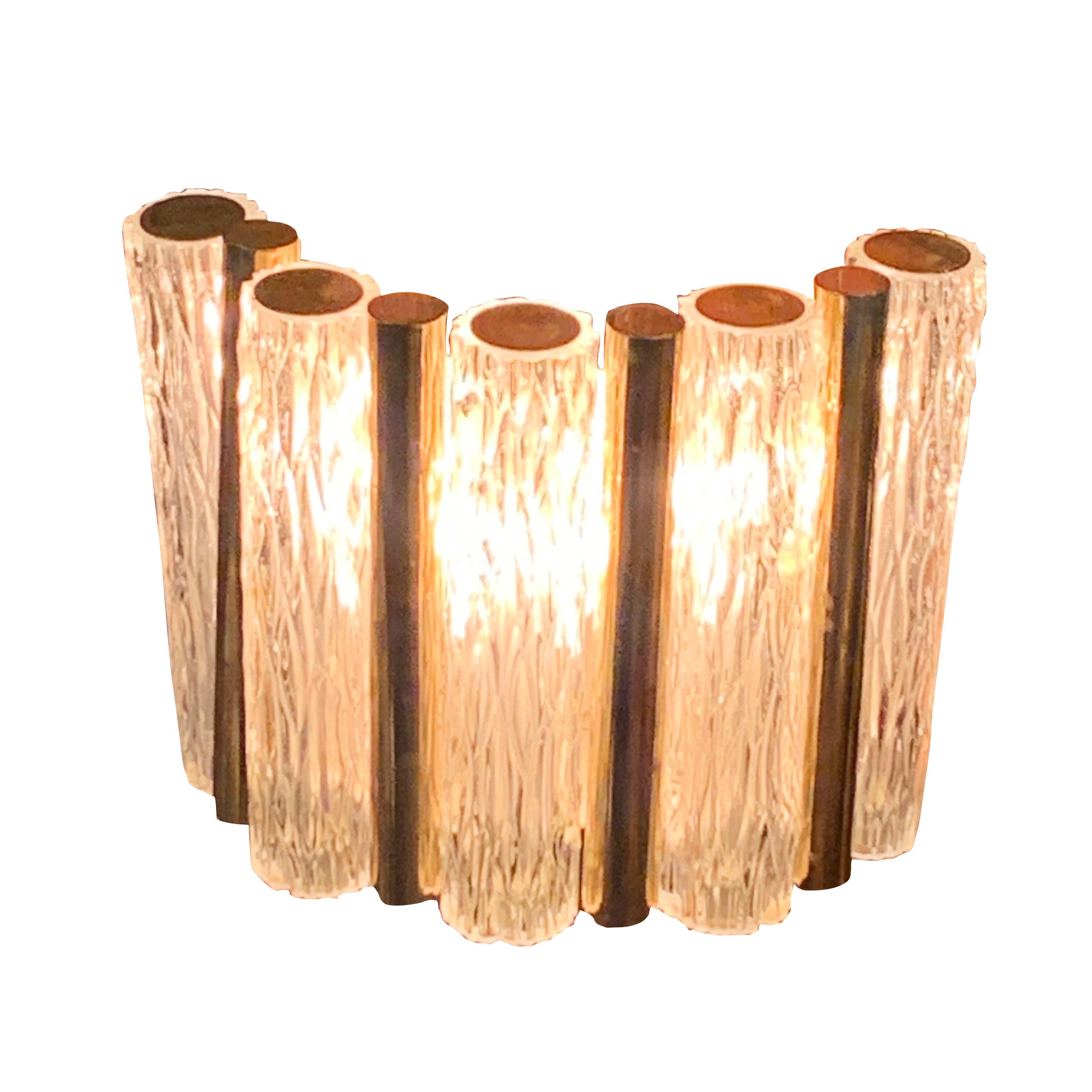 Midcentury French pair of textured glass sconces with bronze trim details.
Five textured glass tubes connected with bronze trim form a half moon shape.
Newly rewired.
Single regular socket with a small bulb.
 
