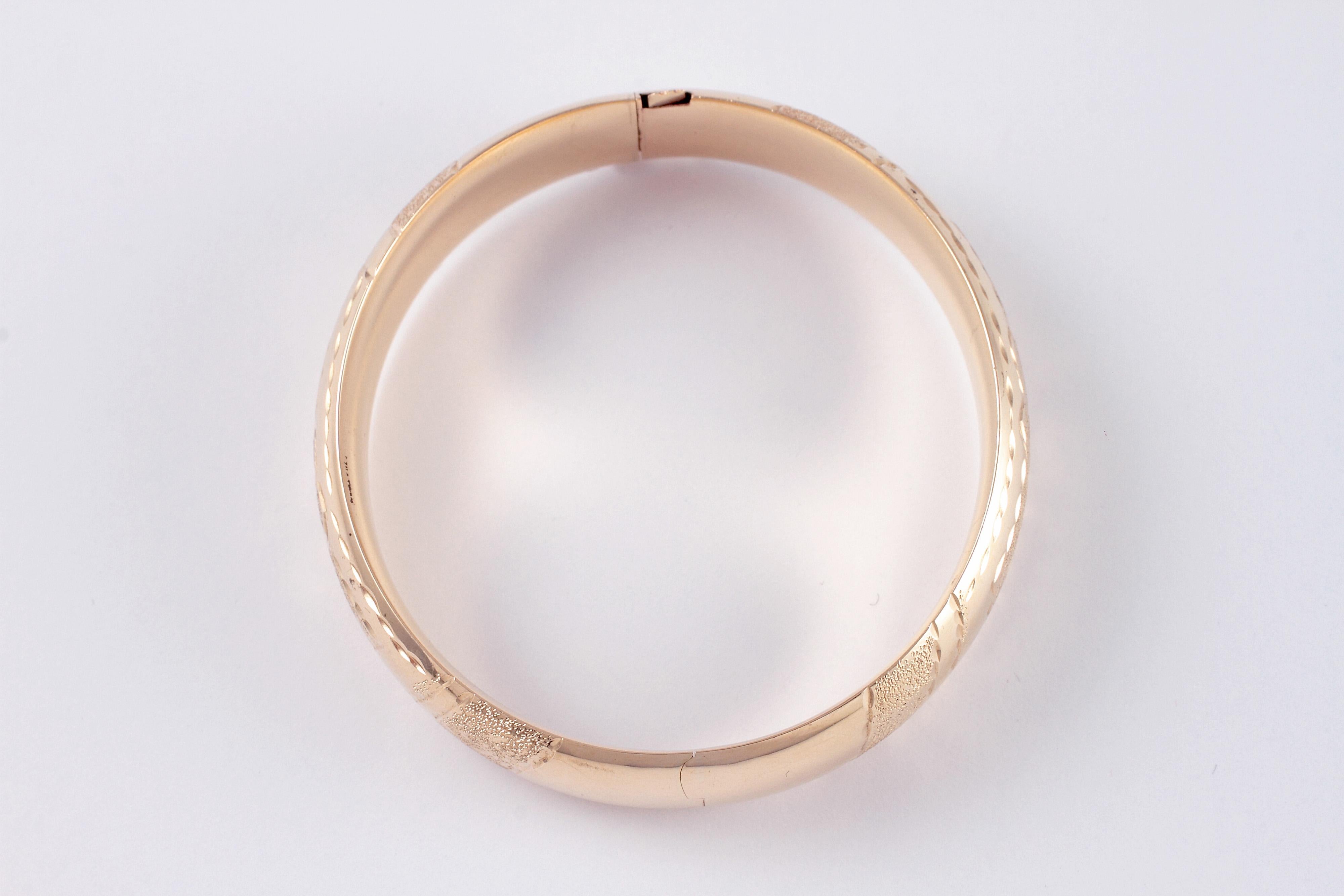 Contemporary Textured Gold Bangle in 14 Karat Yellow Gold