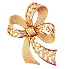 Textured Gold Bow Brooch With Openwork Detail By Crown Trifari, 1960s