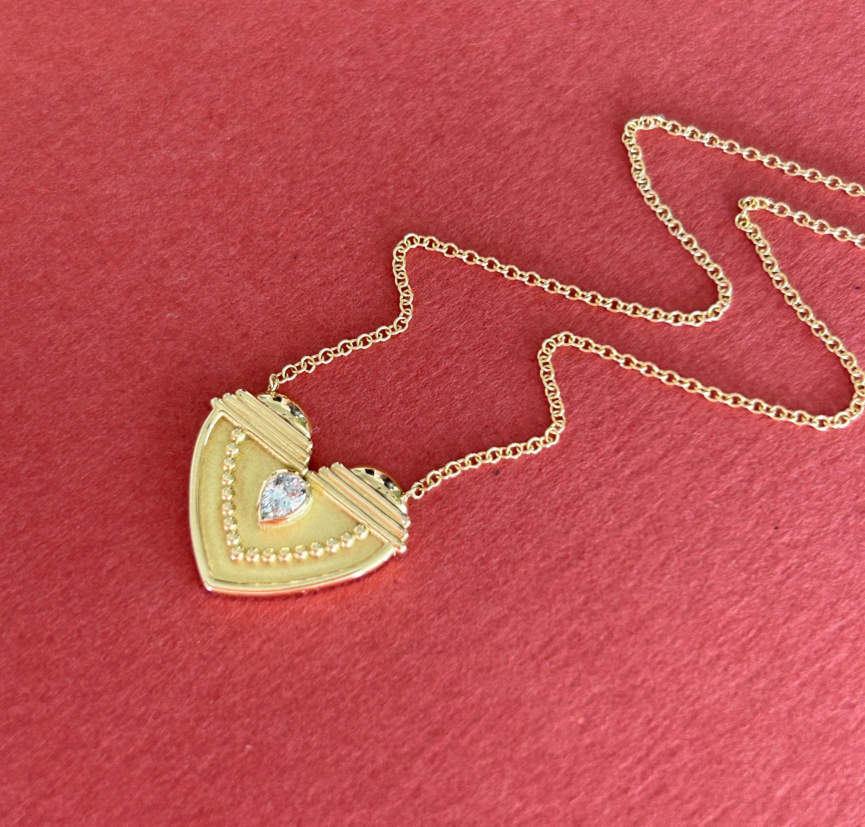 Pear Cut Textured Heart Pendant in 18 Karat Gold With A Pear-Shaped Diamond