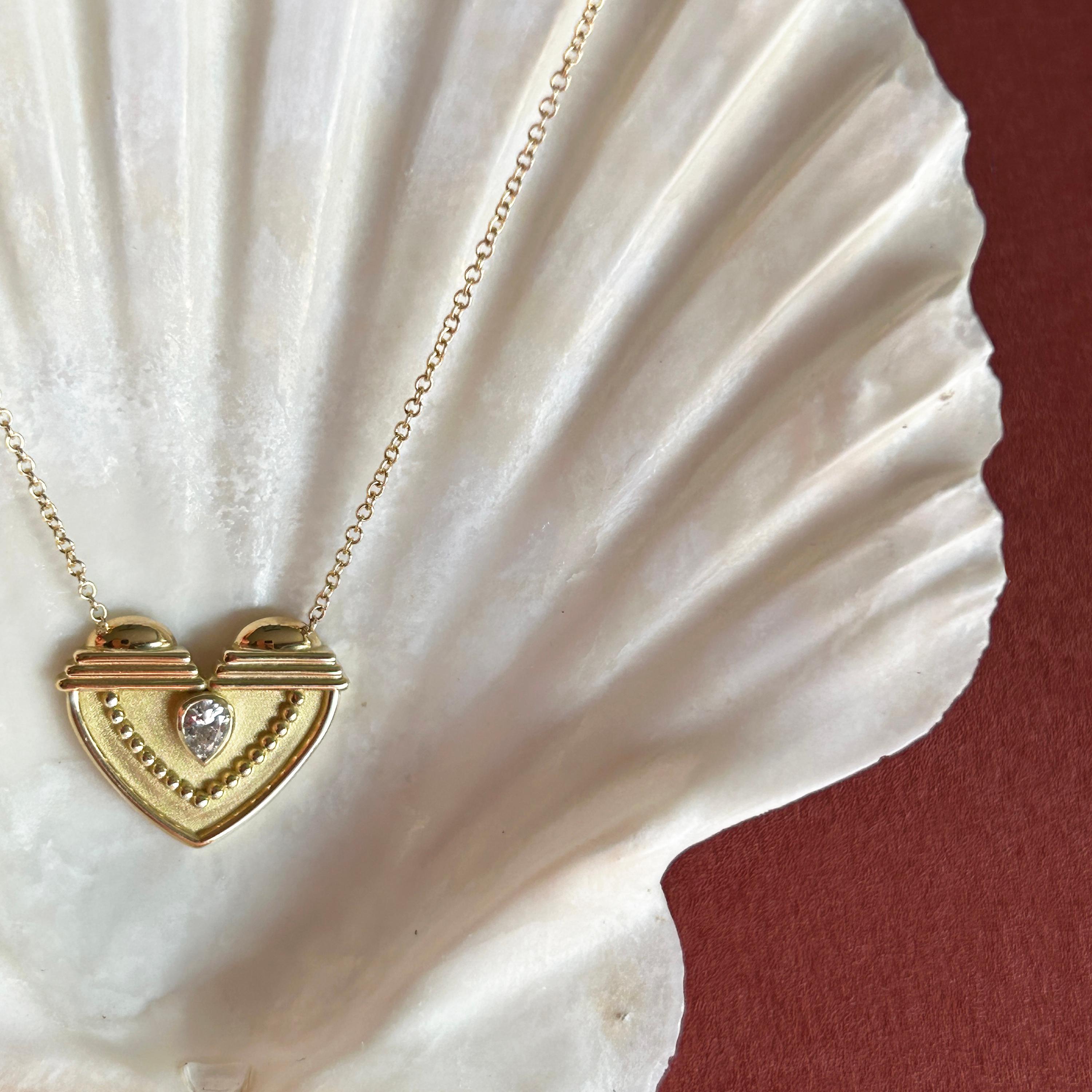 Textured Heart Pendant in 18 Karat Gold With A Pear-Shaped Diamond In New Condition In Athens, Ekali