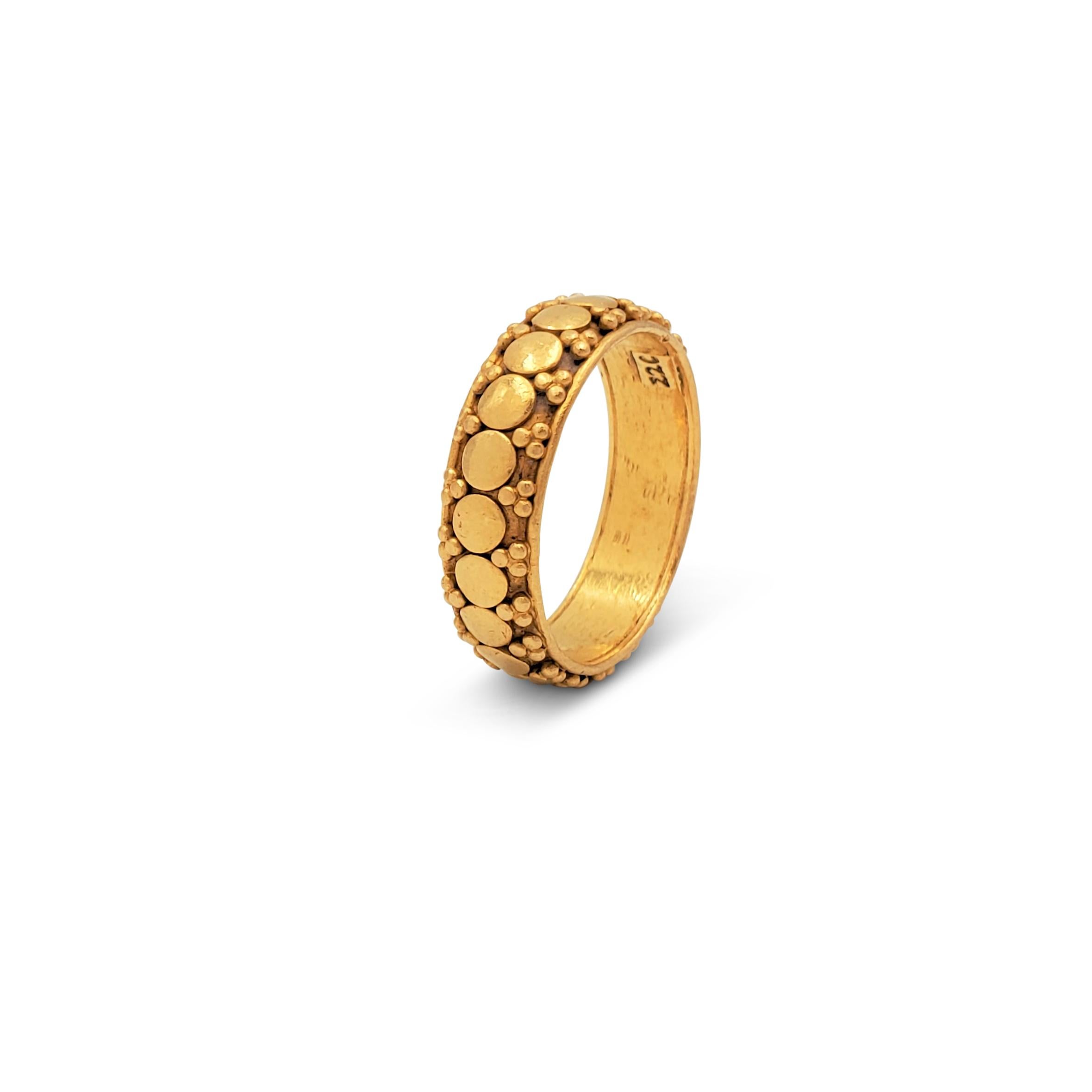 A versatile textured band ring crafted in 22 karat gold. Marked 22C. Ring size US 7. The ring is not presented with the original box and papers. CIRCA 2000s.

Ring Size: US 7
Box: No
Papers: No