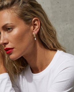 Textured hoops with an antique marquise and an antique pear diamond