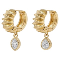 Textured hoops with an antique marquise and an antique pear diamond