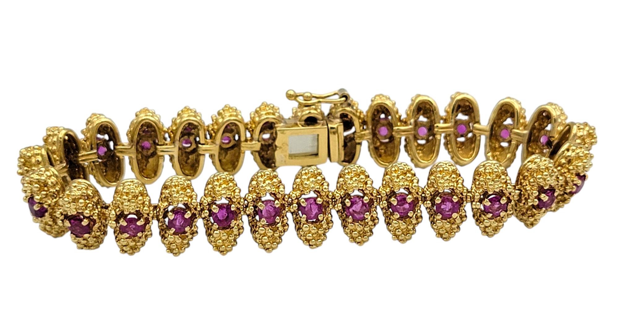 Contemporary Textured Metal Link Bracelet with Round Cut Rubies in 18 Karat Yellow Gold For Sale
