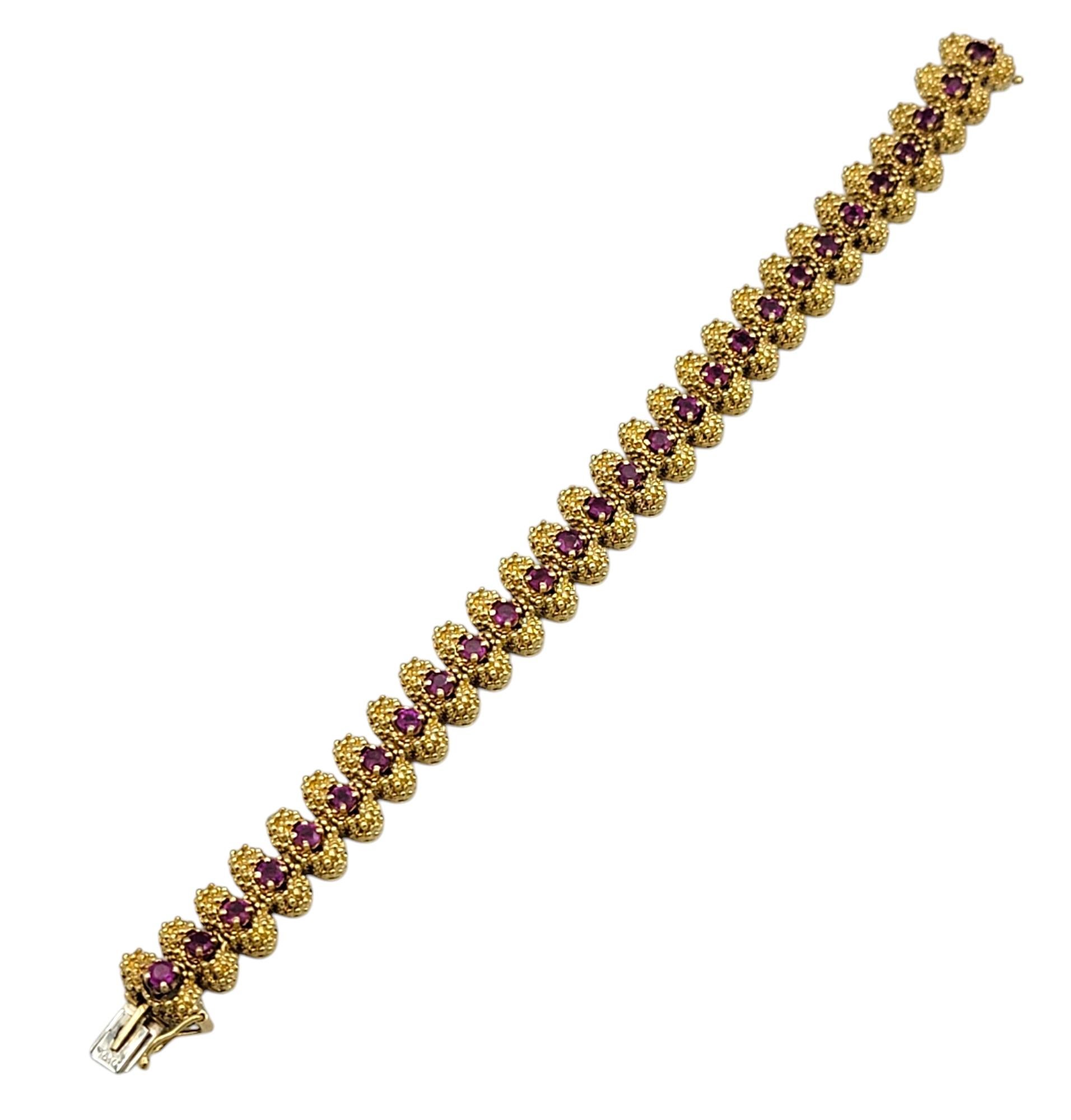 Textured Metal Link Bracelet with Round Cut Rubies in 18 Karat Yellow Gold In Good Condition For Sale In Scottsdale, AZ