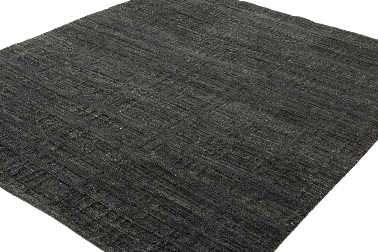 Beautiful handspun Tibetan wool woven with expert Tibetan knotting techniques make this original contemporary design by Joseph Carini a striking and chic rug for any room. The rug has a two dimensional surface giving it a sculptural texture.
