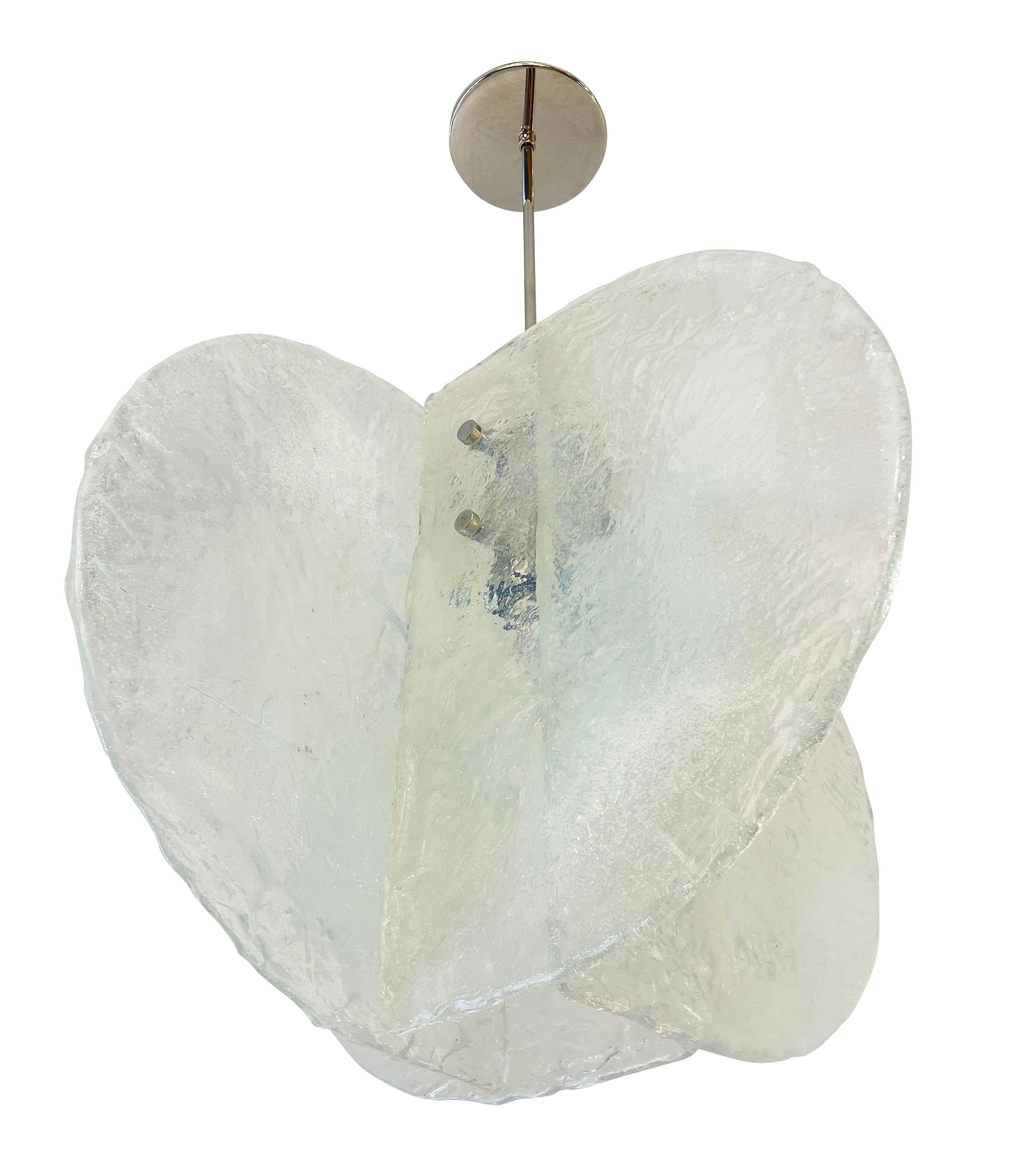 Stunning pendant composed of four textured hand blown glass slabs connected by nickel joints. The glass is iridescent with a light blue coloration. Length of stem can be adjusted as needed. Holds one E26 socket.

Condition: Excellent vintage