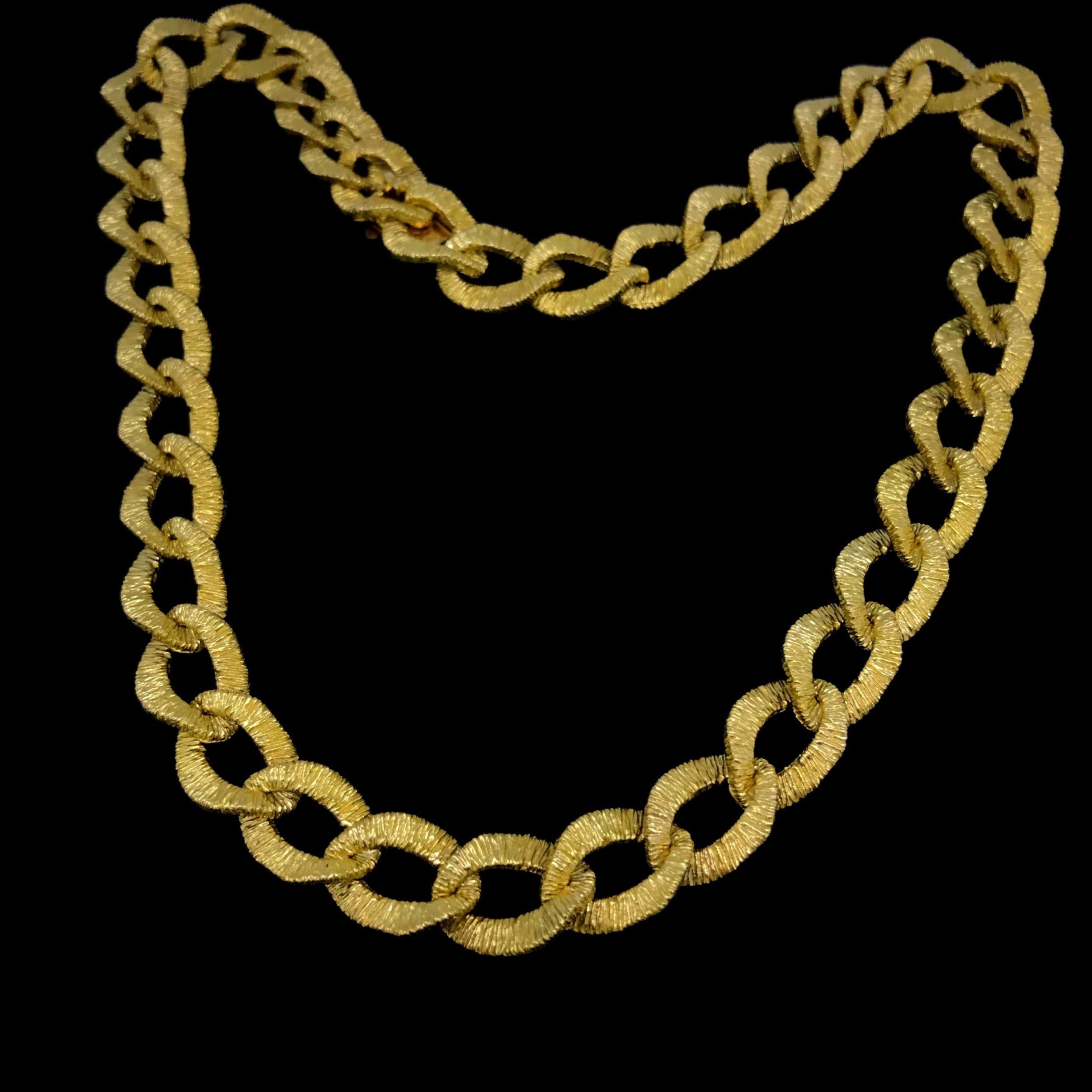 Weight:	65.62 gr

Metal:	18kt Yellow Gold

Condition:	Very Good

Hallmarks:	French, the owl
	
Comments: 	This ravishing collar necklace from the Seventies is fully made in 18k yellow gold. The necklace is very pleasant to wear and the links are
