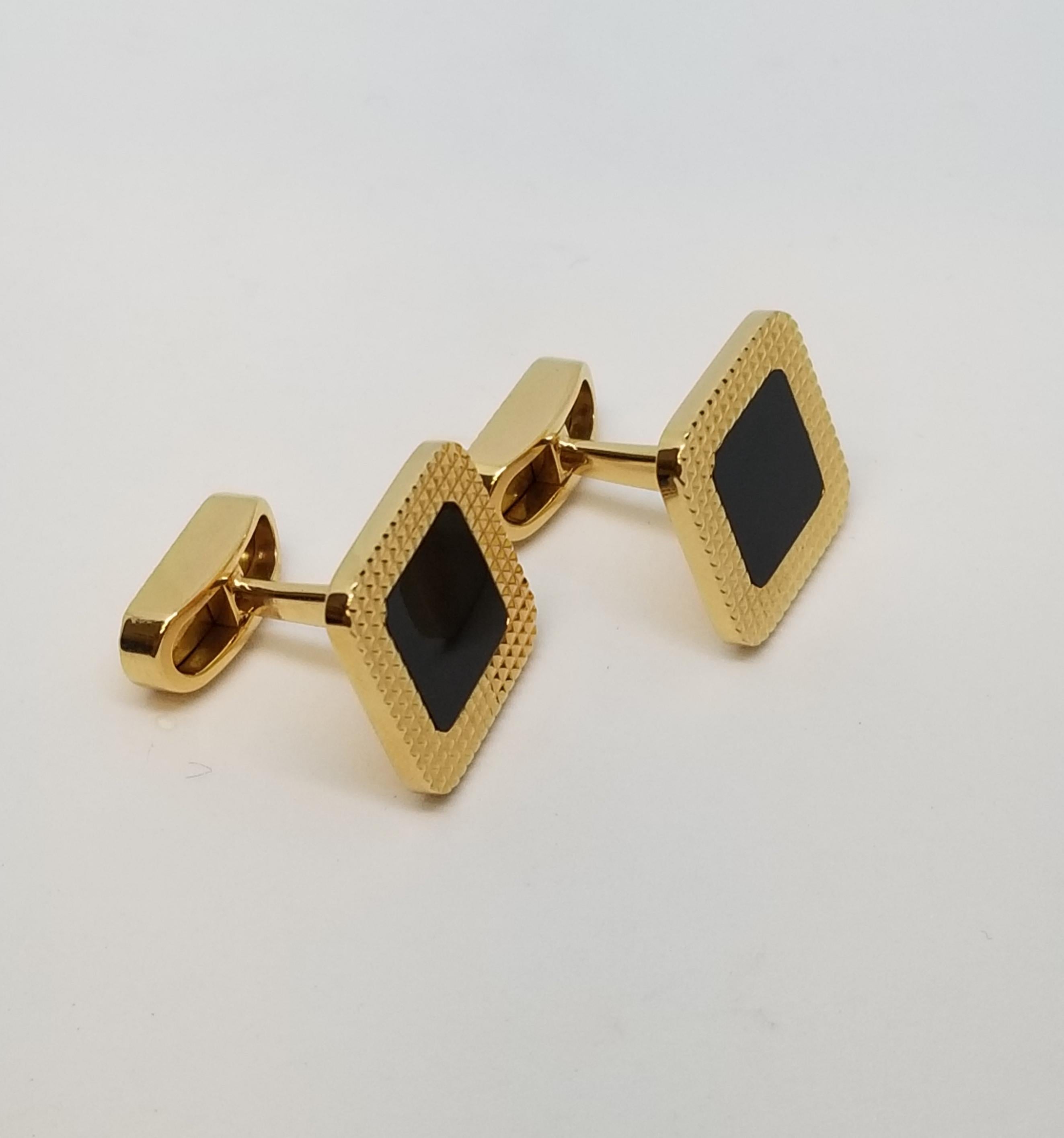 You will always be square when wearing these handsome textured black onyx and 18 karat rose gold whale back cufflinks.  5/8