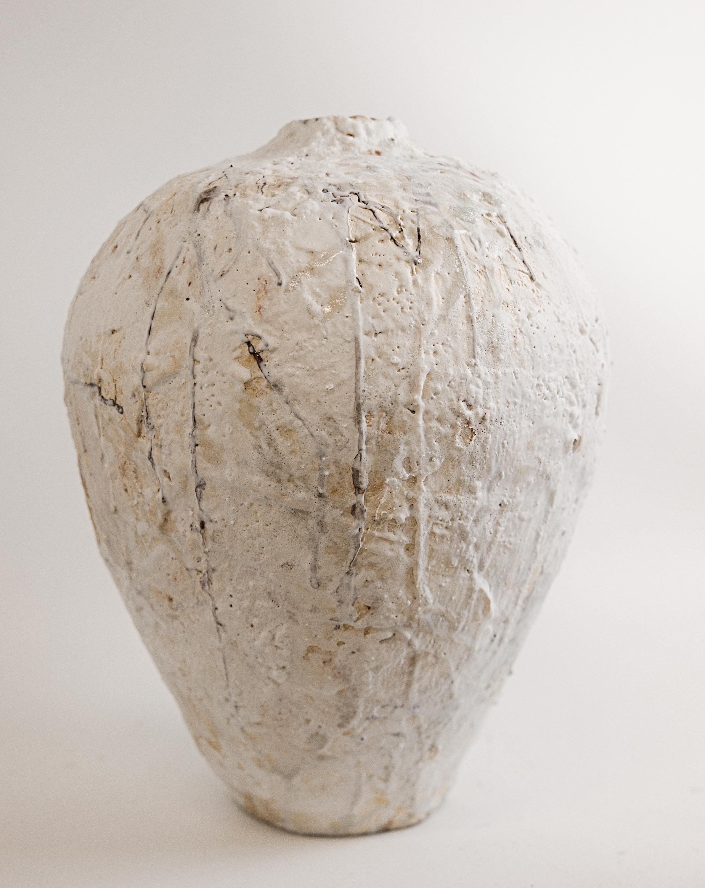 Discover the Painted 25 Series- Vessel V, where the exploration of handprinted Oxides and custom glazes 