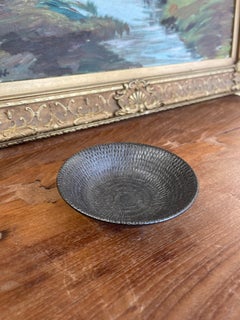 Textured Studio Pottery Bowl in Dark Iron-Glaze Finish with Radiating Pattern.
