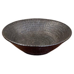 Textured Studio Pottery Bowl in Dark Iron-Glaze Finish with Radiating Pattern.