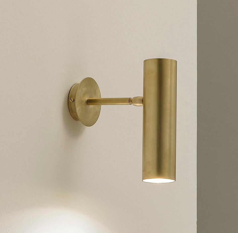 TF400 Wall Lamp in Satin Brass with Orientable Tubular Diffuser by Daluce
Dimensions: D 13,3 x 6 x H 20 cm. 
Materials: Brass.

Available in different finish options: light satin burnished brass, medium satin burnished brass, and dark satin