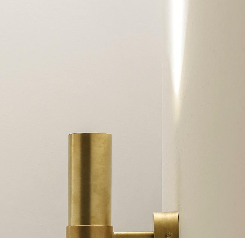 TF410 Wall Lamp in Satin Brass with Two Orientable Tubular Diffusers by Daluce
Dimensions: D 13,4 x 6 x H 25,8 cm. 
Materials: Brass.

Available in different finish options: light satin burnished brass, medium satin burnished brass, and dark satin