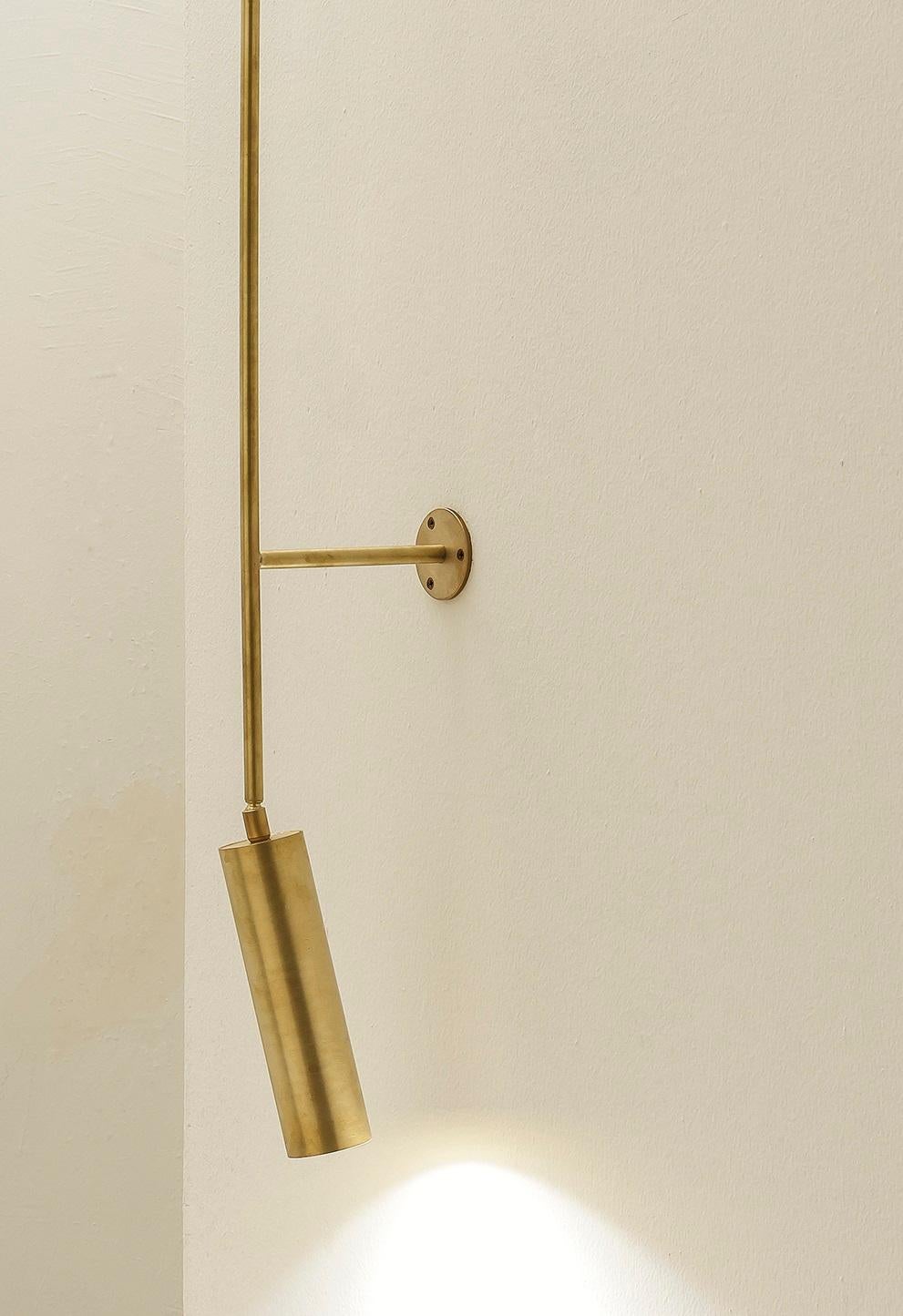 TF411 Wall Lamp in Satin Brass with an Orientable Tubular Diffuser by Daluce In condizioni Nuovo in vendita a Geneve, CH