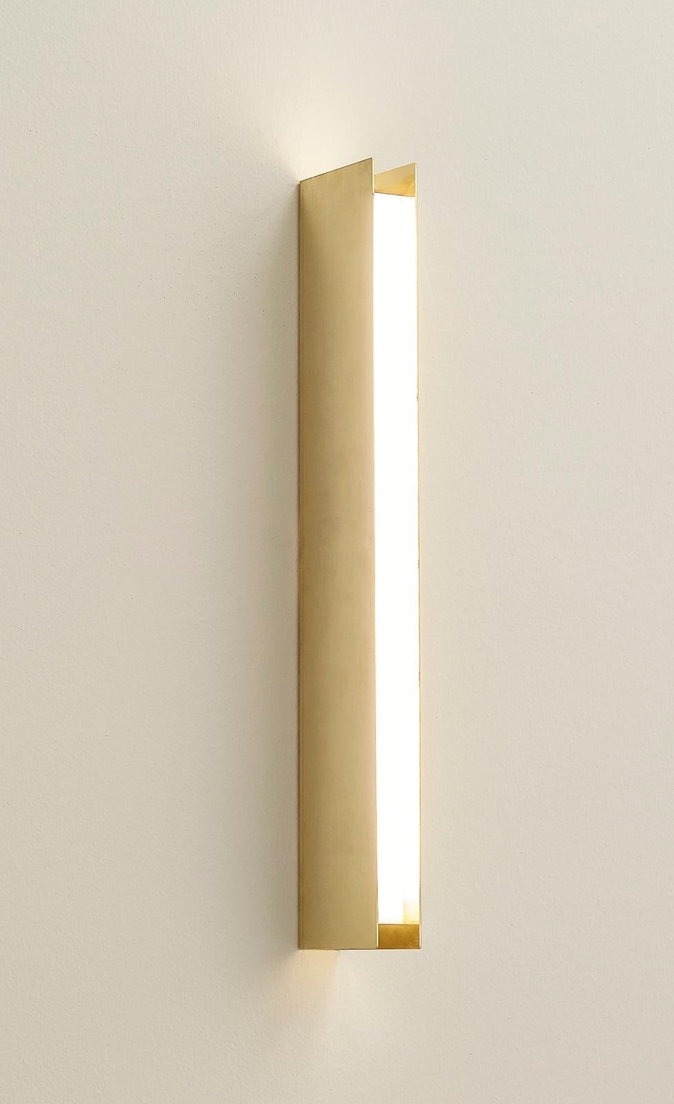 TF470 Wall Lamp in Satin Brass with Opaline Acrylic Diffuser by Daluce
Dimensions: D 10,3 x 41,1 x H 56 cm. 
Materials: Brass and acrylic.

Available in different finish options: light satin burnished brass, medium satin burnished brass, and dark