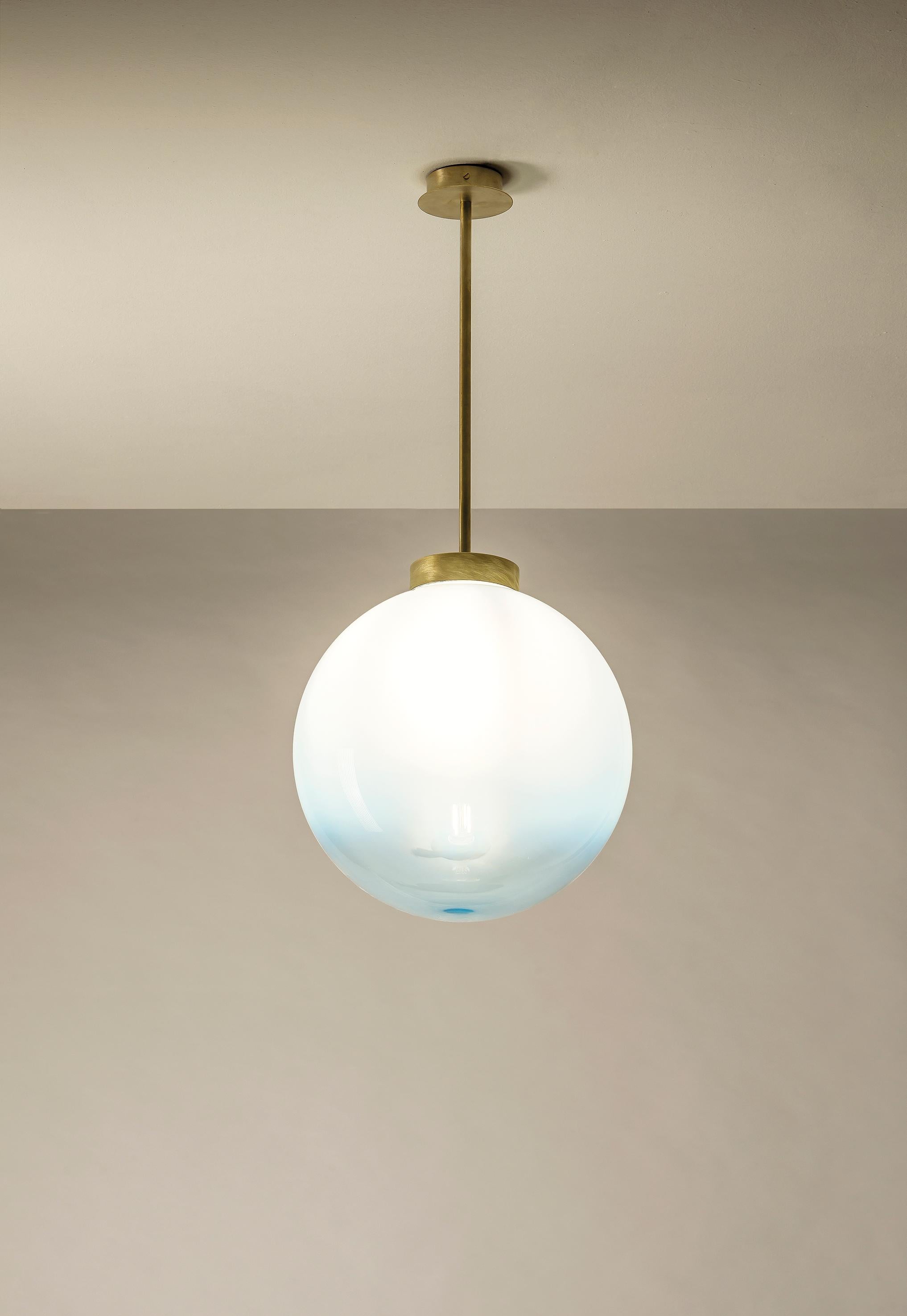 TF530 Ceiling Lamp in Satin Brass with a White Blown Glass Sphere by Daluce
Dimensions: Ø 30 x H 64 cm. 
Materials: Brass and blown glass.

Available in different finish options: light satin burnished brass, medium satin burnished brass, and dark