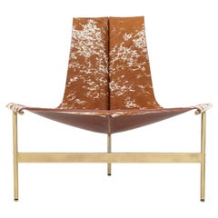 Fauteuil de salon TG-15 en poils mouchetés brun clair et blancs sur peau avec cadre