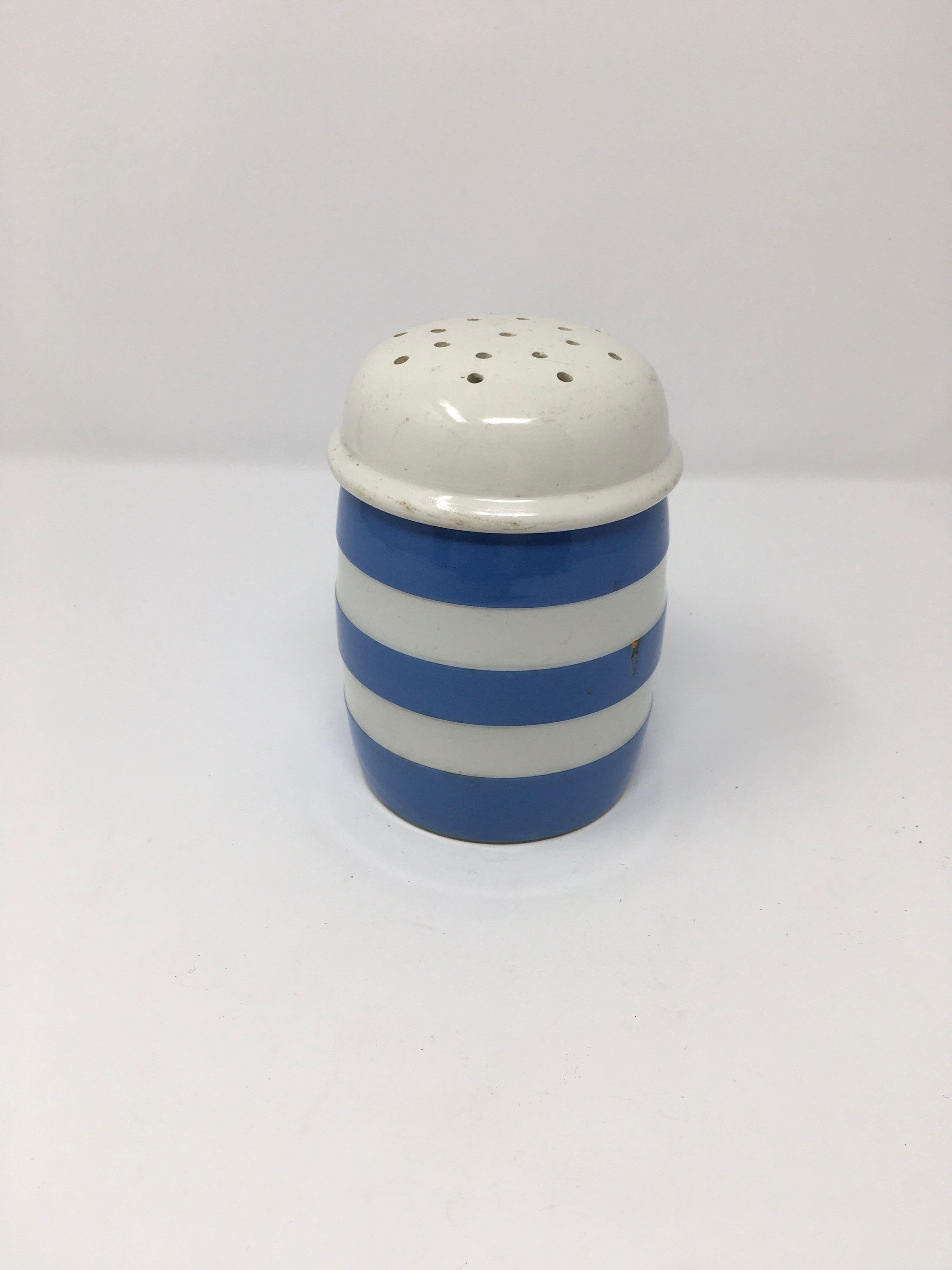 This T.G. Green Cornishware flour Shaker is the perfect baking accessory! The sheild mark in green on the bottom dates the Shaker from 1924-1967. The striped style, made using lathe-turning technique, remains one of the companies most popular lines.