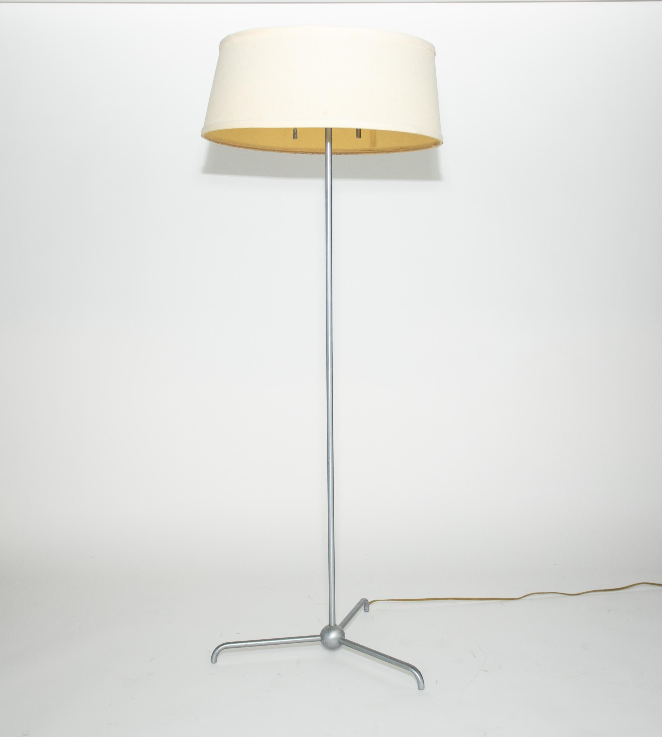 TH RobsJohn Gibbings Tripod Floor Lamp.
Manufactured by Hansen 
Original surface to metal
Diffuser marked Hansen
