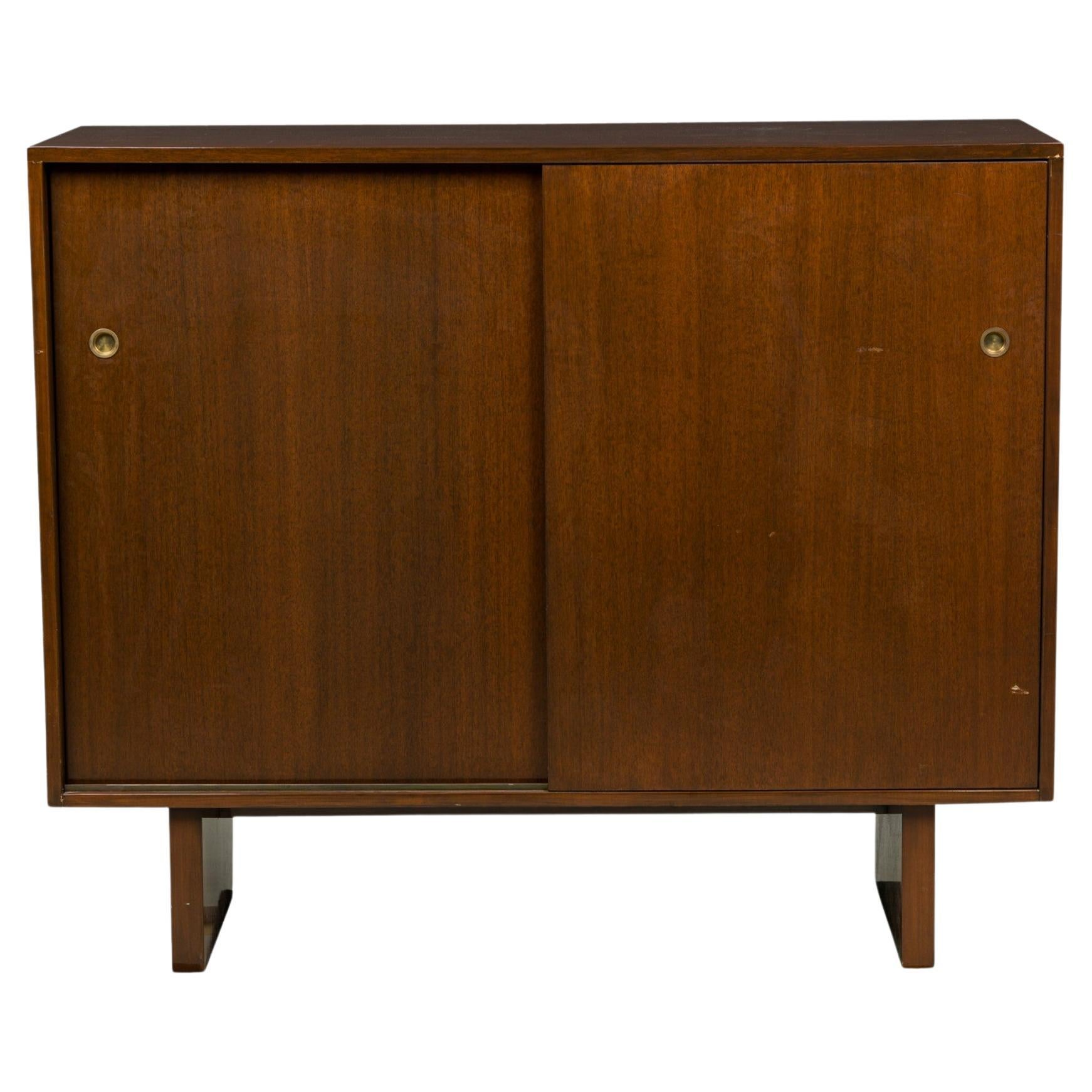 T.H. Robsjohn-Gibbings American Lacquered Walnut Sliding Door Cabinet For Sale