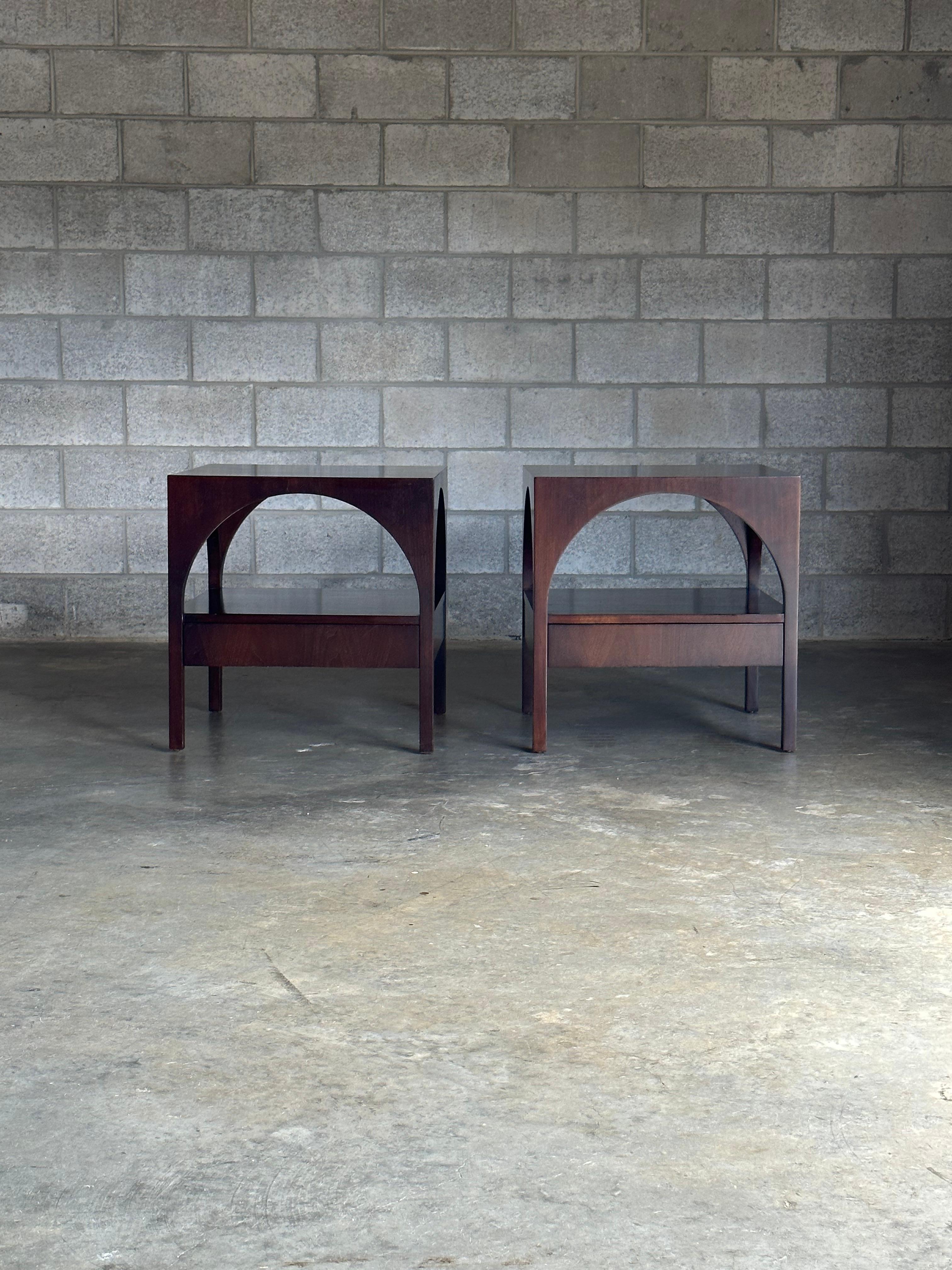 Rare pair of oversized end tables or nightstands by T.H. Robsjohn-Gibbings for Widdicomb “Coliseum”. These are an extremely uncommon design and unique to the market. They are well scaled with a single arch on every side and completely finished on