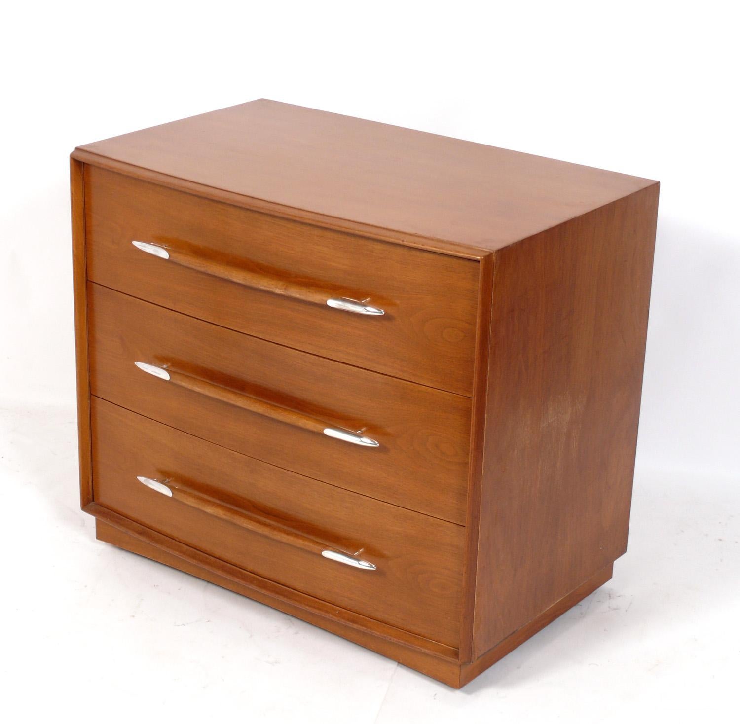 Elegant Modern chest or dresser, designed by T.H. Robsjohn Gibbings for Widdicomb, American, circa 1950s. This chest is currently being refinished and can be completed in your choice of color(including the original color as shown). The price noted