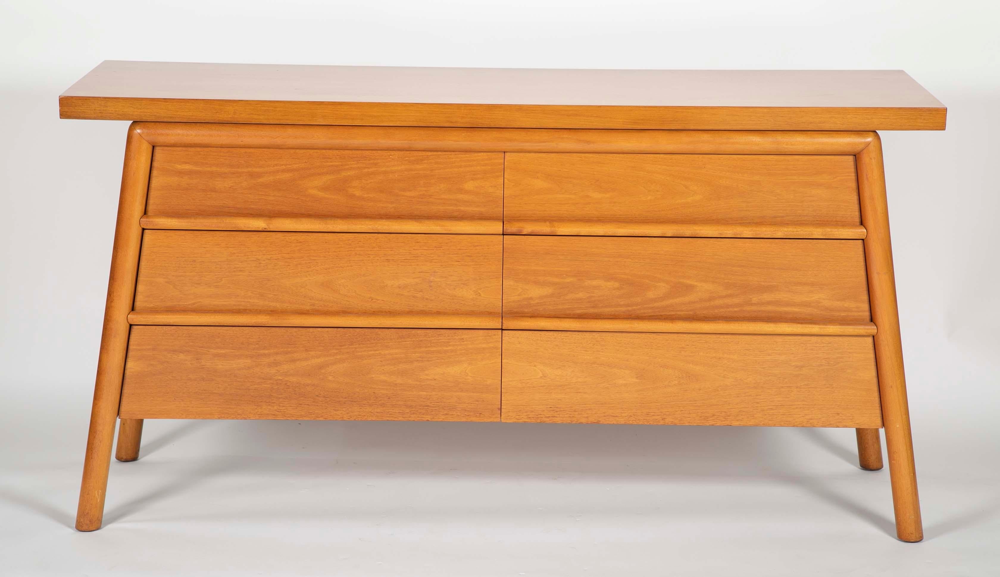 T.H. Robsjohn-Gibbings credenza bleached Mahogany six-drawer credenza with slab top and canted legs.
