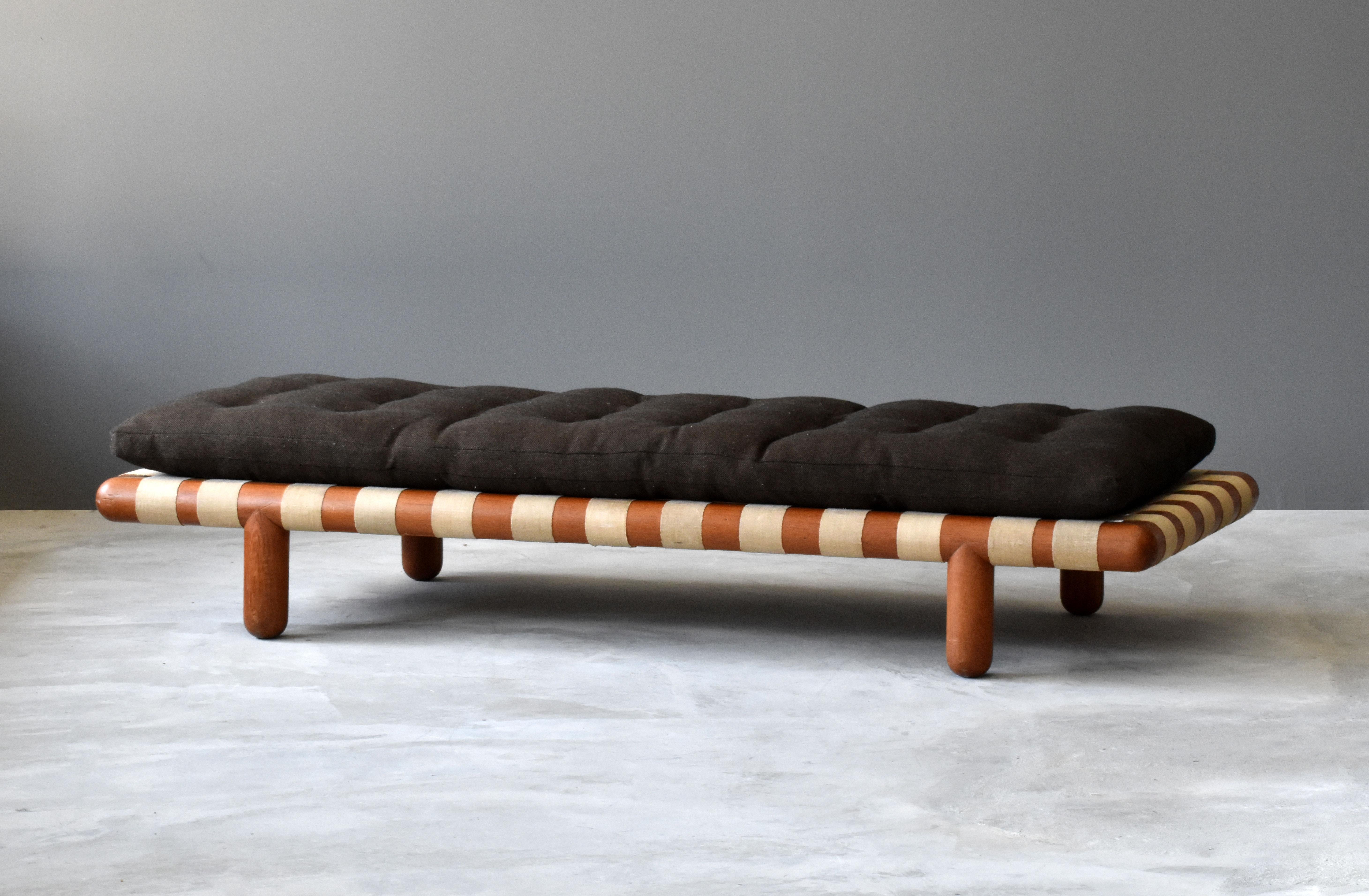 A daybed by Terence Harold Robsjohn-Gibbings, produced by Widdicomb Furniture Company, circa 1950. Model number 