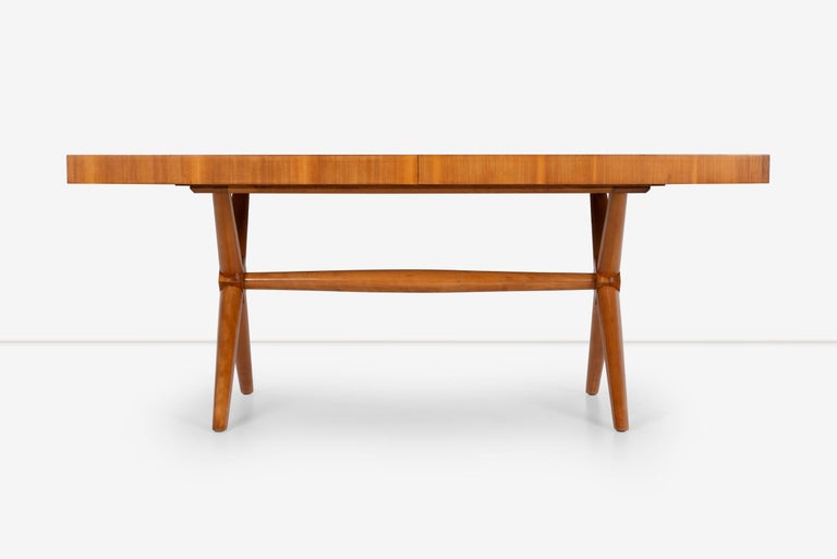 T.H. Robsjohn-Gibbings dining table for Widdicomb
Sold with one 20-inch leaf; table measures 92