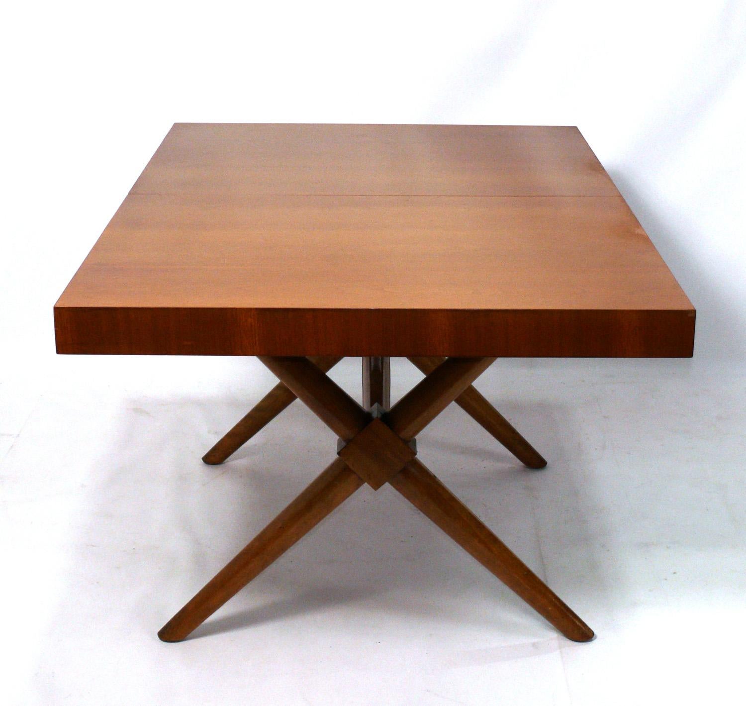 Sculptural X Base Dining Table, designed by T.H. Robsjohn Gibbings for Widdicomb, American, circa 1950s. This dining table is currently being refinished and can be completed in your choice of color. The price noted INCLUDES refinishing in your
