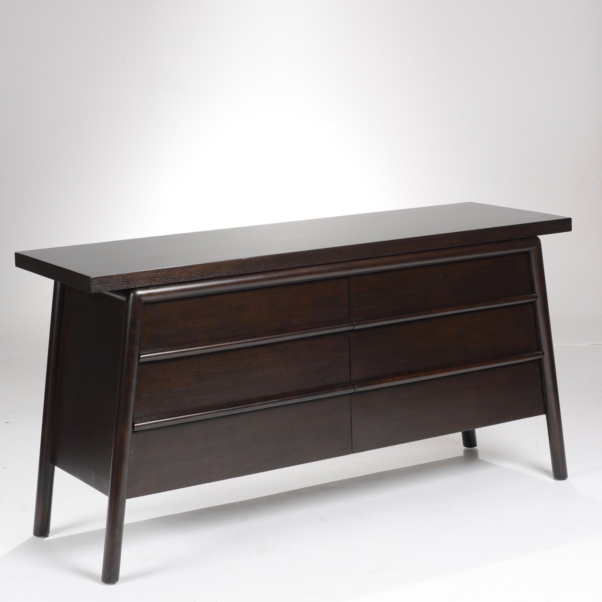 T.H. Robsjohn-Gibbings for Widdicomb ebonized mahogany six-drawer credenza with slab top and canted legs in really great condition. 

All items are viewable at our Los Angeles Arts District showroom and warehouse. 