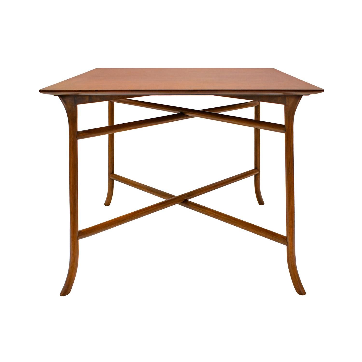 Large end table model 3334 in walnut with double stretcher design and Klismos legs by T.H. Robsjohn-Gibbings for Widdicomb, American 1957 (Label on bottom reads “Widdicomb Grand Rapids” underneath with stamped date and model number). The double