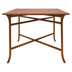 T.H. Robsjohn-Gibbings Elegante mesa auxiliar de nogal con extensibles 1957 (Firmada)
