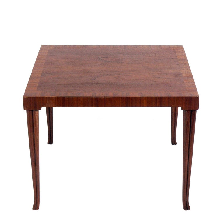 Rare end or side table, designed by T.H. Robsjohn Gibbings for Baker, circa 1950s. This line was only in production for a couple years and is very hard to find. It is most closely related to the Greek influenced designs that Gibbings did for