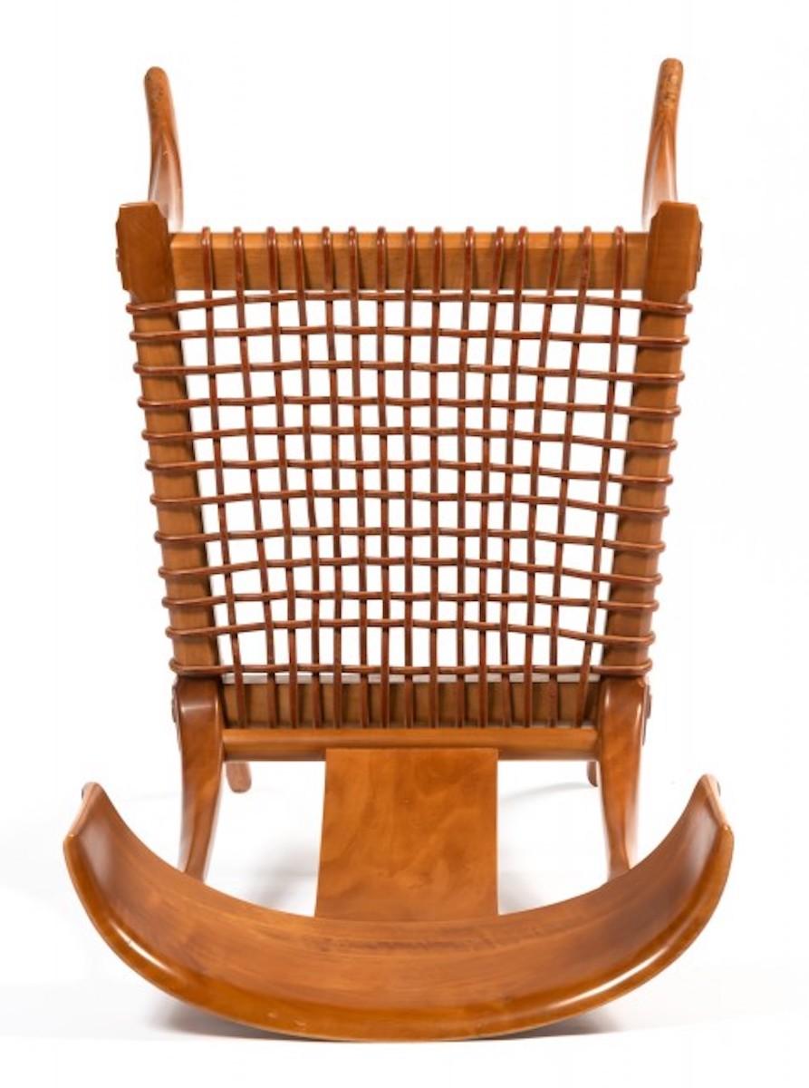 T.H. Robsjohn-Gibbings Klismos chairs for Saridis of Athens, Greece in Greek walnut and leather woven seats. 

This chairs was part of the collection he designed for Saridis of Athens in 1961, inspired by the drawings he saw on ancient Greek