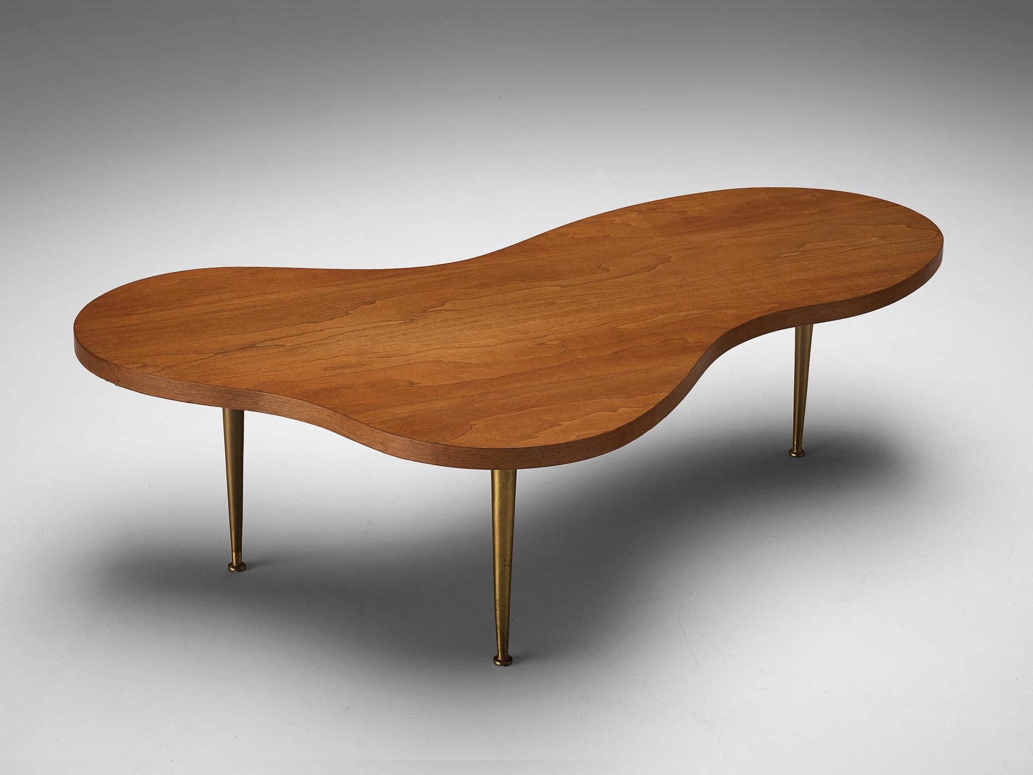 T.H. Robsjohn-Gibbings for Widdicomb, coffee table 1759, cherry, brass, United States, 1960s

This freeform coffee table by T.H. Robsjohn-Gibbings for Widdicomb is made out of warm coloured cherrywood. The biomorphic tabletop rests on four brass