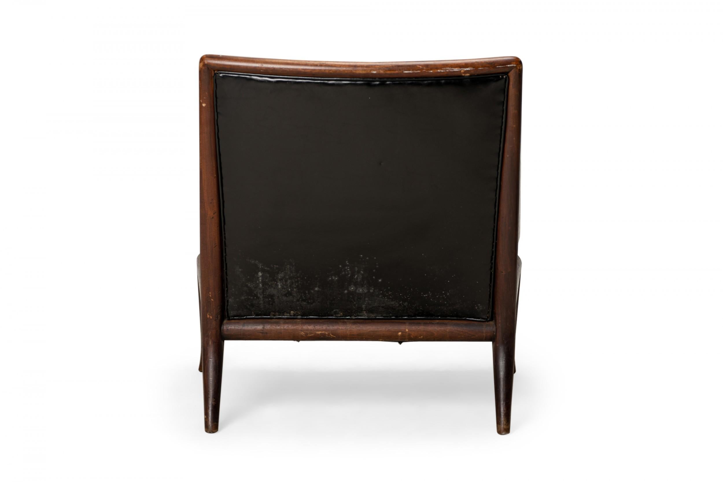 T.H. Robsjohn-Gibbings for Widdicomb Black Tufted Leather Lounge Chair In Good Condition For Sale In New York, NY