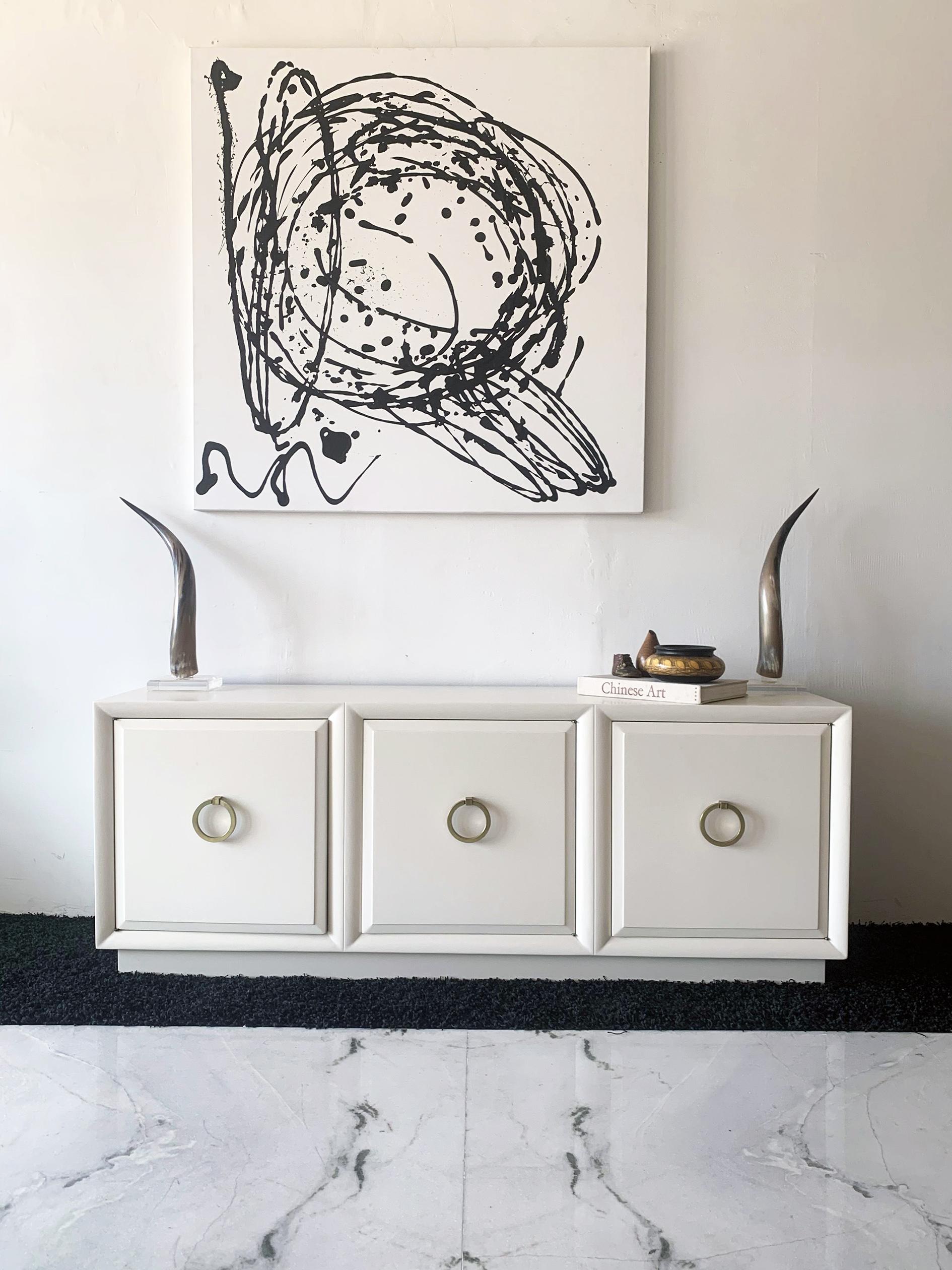 Available right now I have this absolutely stunning T.H. Robsjohn Gibbings for Widdicomb credenza. This stunner has been expertly refinished and lacquered white for a timelessly chic look that any mid century modern aficionado would approve