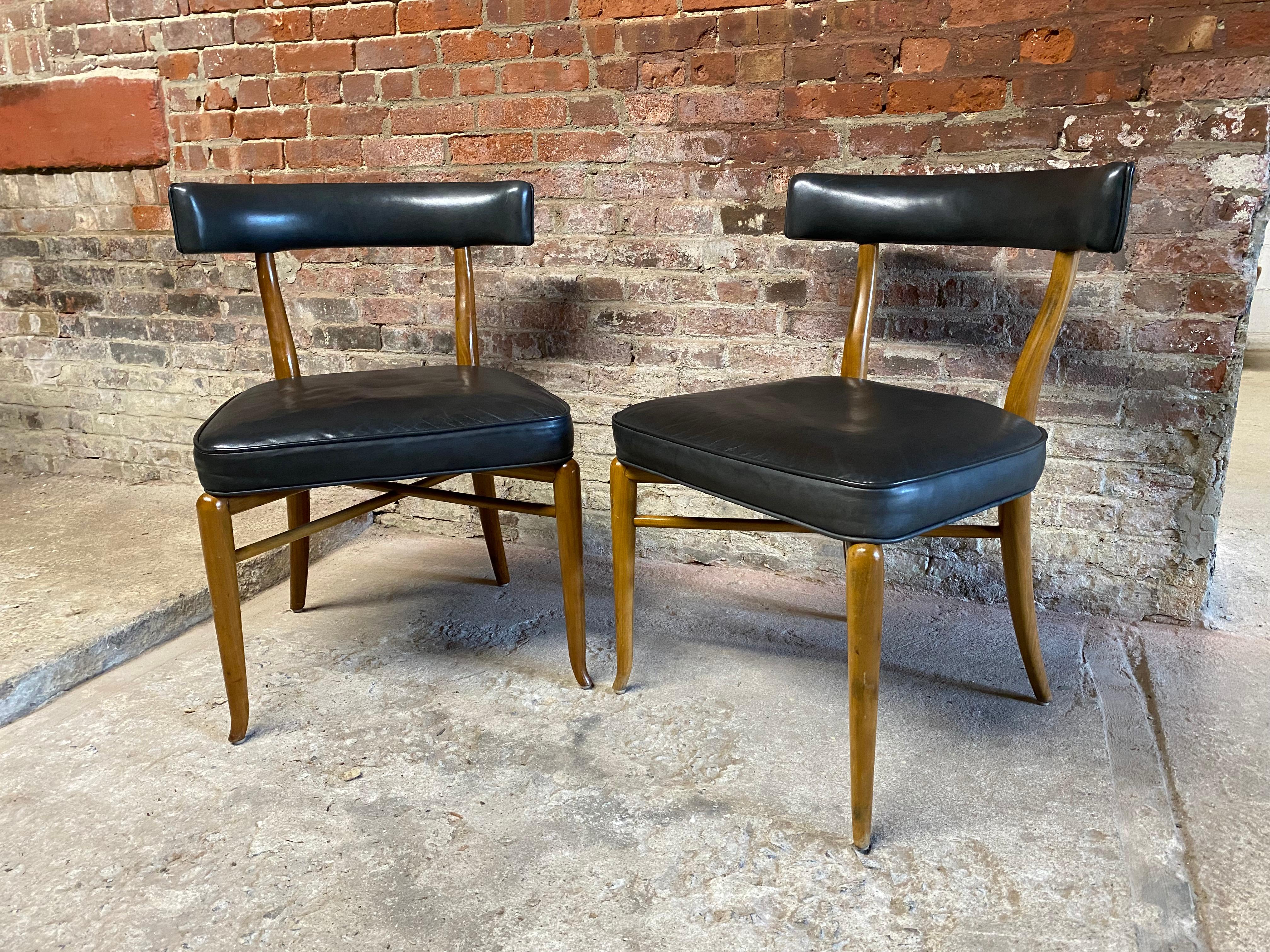Gibbings design for Widdicomb. Featuring his curvaceous tapered leg and barrel backs. Circa 1950-60. Beautiful lyrical design. Leather backs and seats. The price is for the pair.

Measure approximately 22