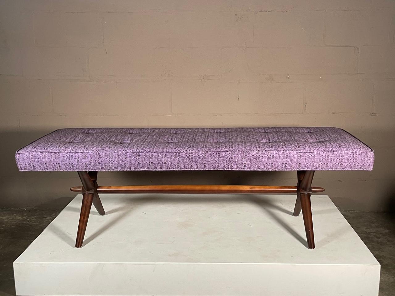 A classic T.H. Robsjohn-Gibbings for Widdicomb upholstered bench. Solid walnut X base, upholstered in NOS vintage fabric (sample available).