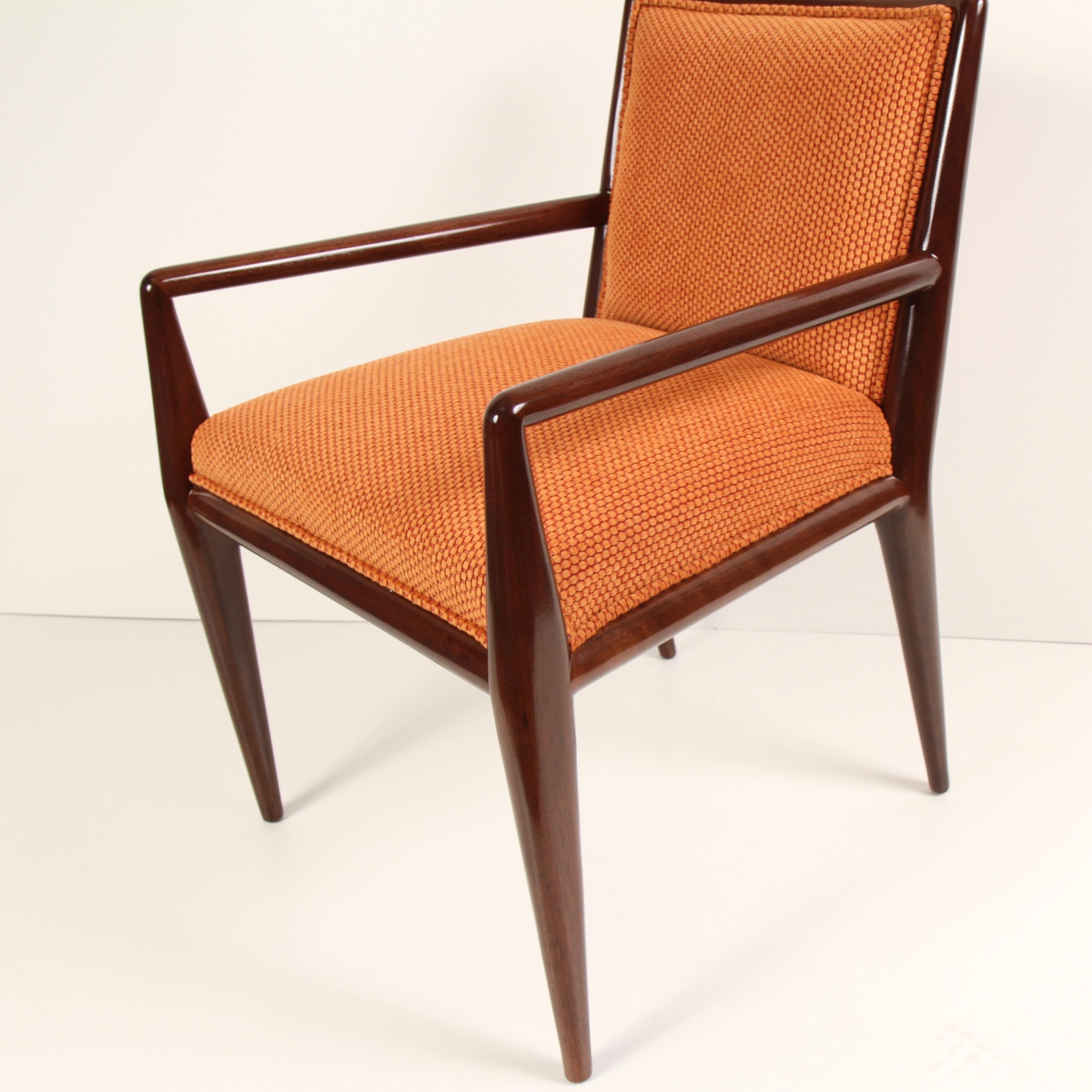 Classic midcentury armchair by T.H. Robsjohn-Gibbings for Widdicomb. Newly refinished and reupholstered in a contemporary, burnt-orange textured fabric.