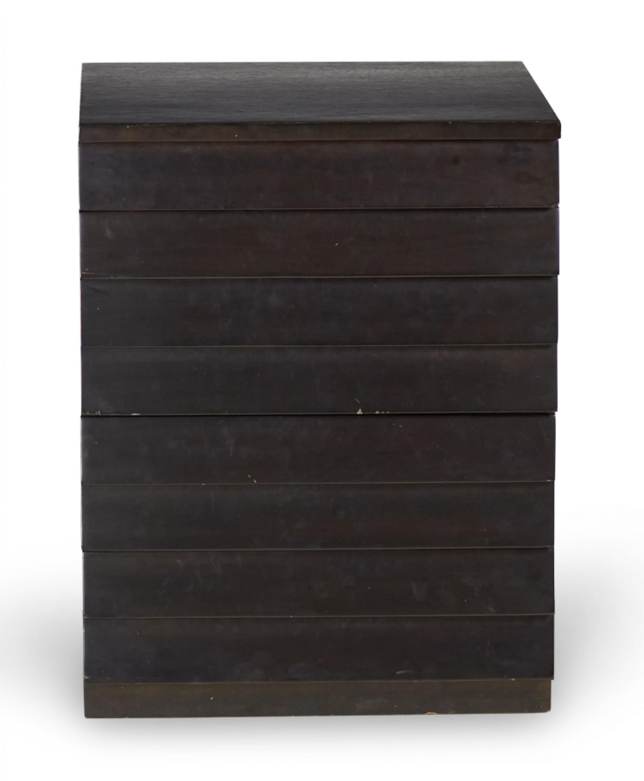American mid-century dark stained walnut chest / nightstand with a louver-style front concealing two small drawer and 3 larger drawers below. (T.H. Robsjohn-Gibbings for Widdicomb).
   