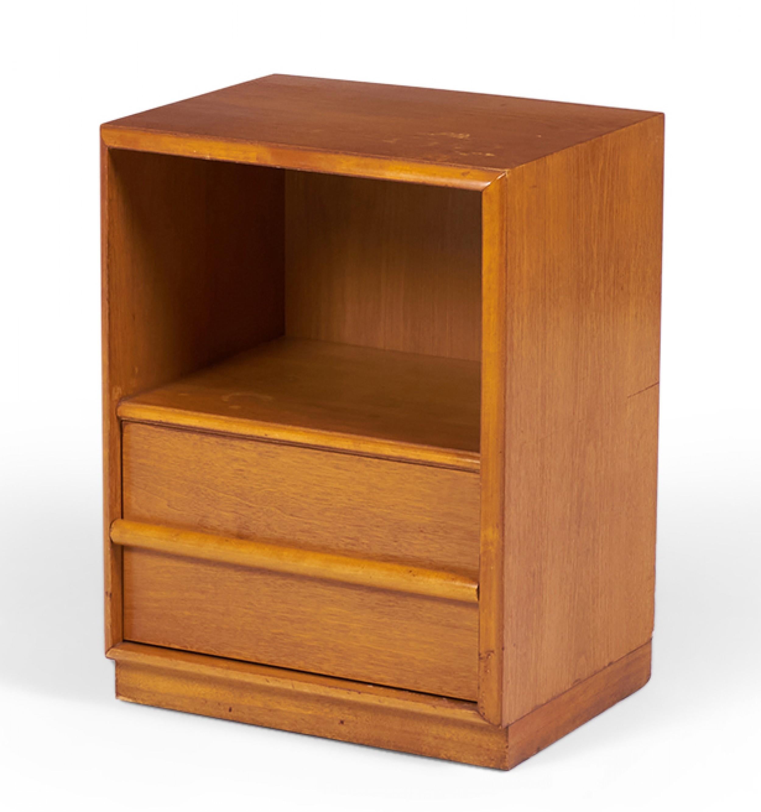 American Mid-Century walnut nightstand with an open upper cabinet shelf and a single lower drawer with a horizontal raised wooden drawer pull. (T.H. ROBSJOHN-GIBBINGS FOR WIDDICOMB)(Same piece with different finish: DUF0143A&C).