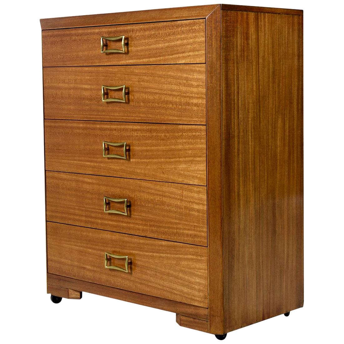 Yellow mahogany highboy dresser chest of drawers by Robsjohn-Gibbings for Widdicomb. This early representation by Widdicomb is at the turning point between machine age and modern. The mahogany has aged to a rich honey color. Sleek and stately with