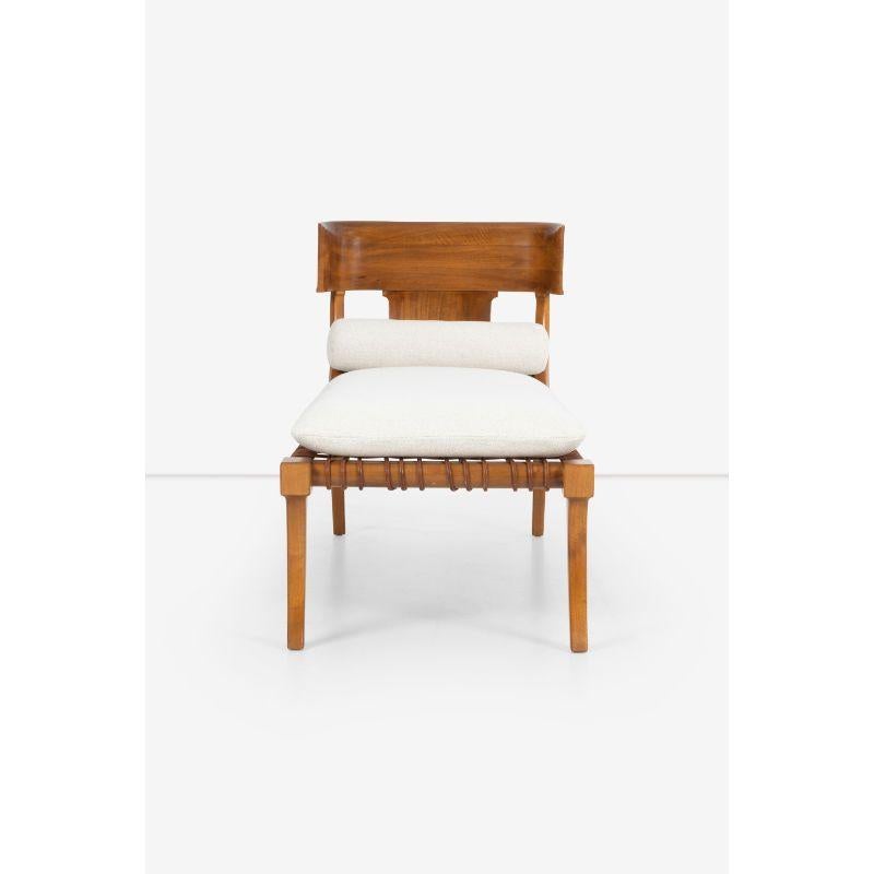 T.H. Robsjohn-Gibbings Klini chaise, model no. 11 for Saridis of Athens, United Kingdom / Greece, 1961
Walnut frame with leather rope supports, newly upholstered cushion and bolster.
Seat: 18
Brass manufacturer's label to underside ‘Designed by